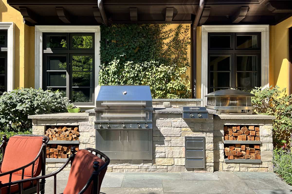 Outdoor Kitchen with Open Wood Storage in Island