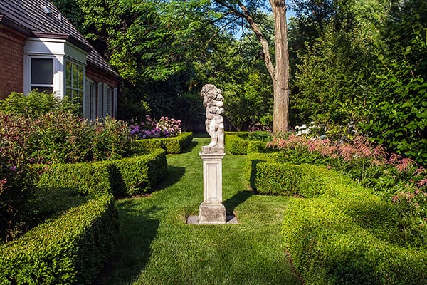 formal garden with statue in winnetka, illinois