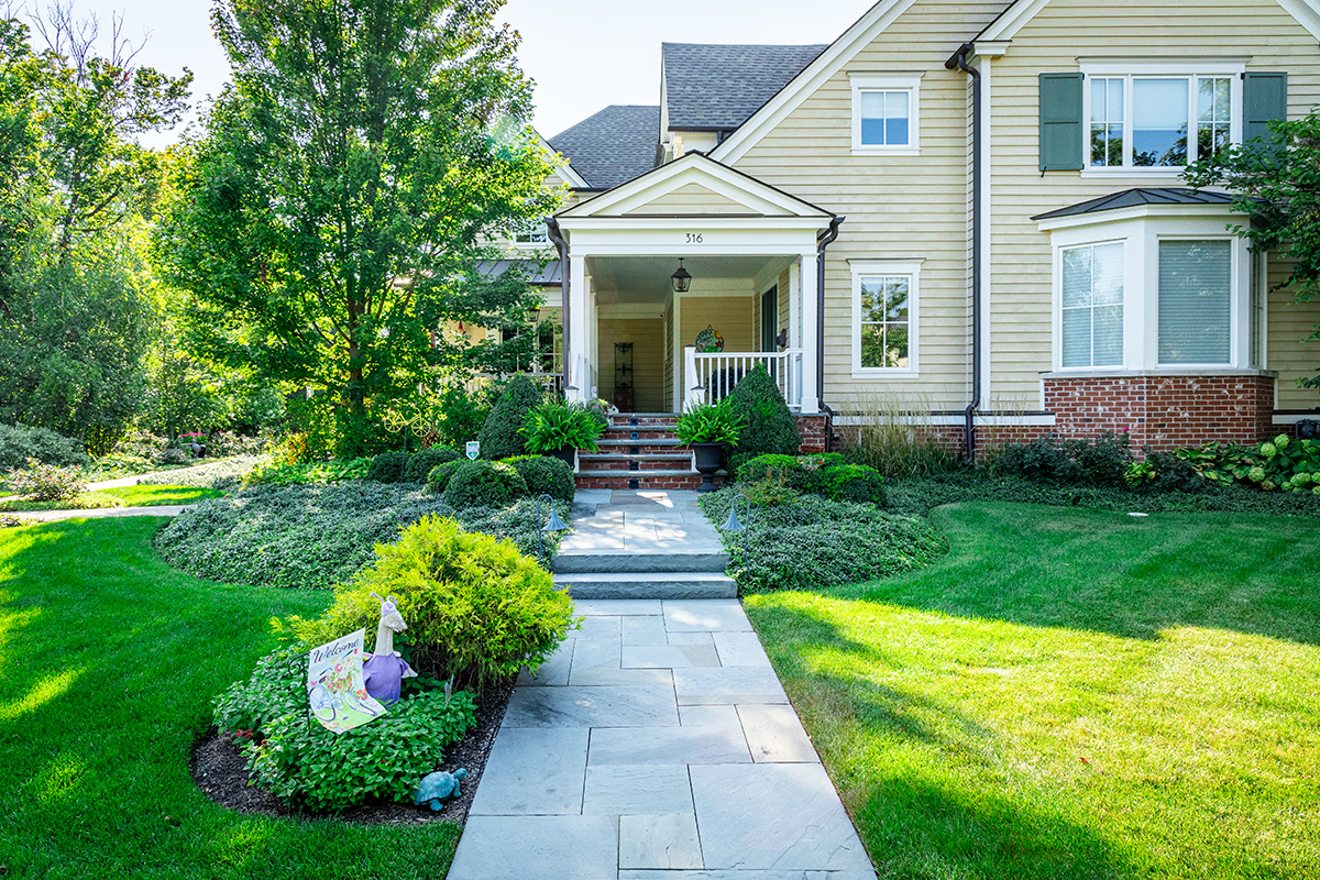 Welcoming Front Entrance with Bluestone Walkway