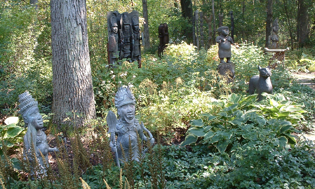 garden art in woods