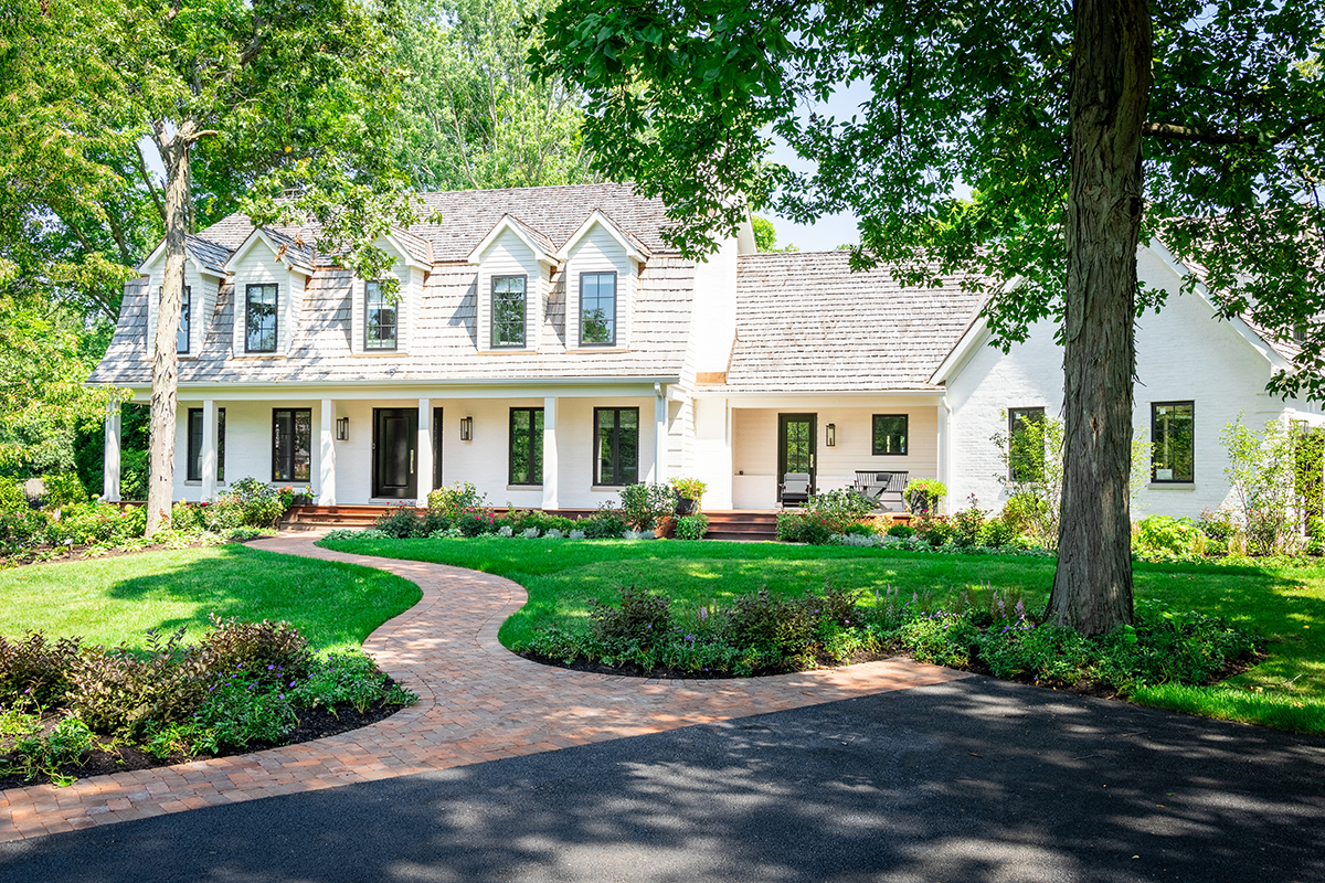 Elegant Front Yard with Brick Walkway