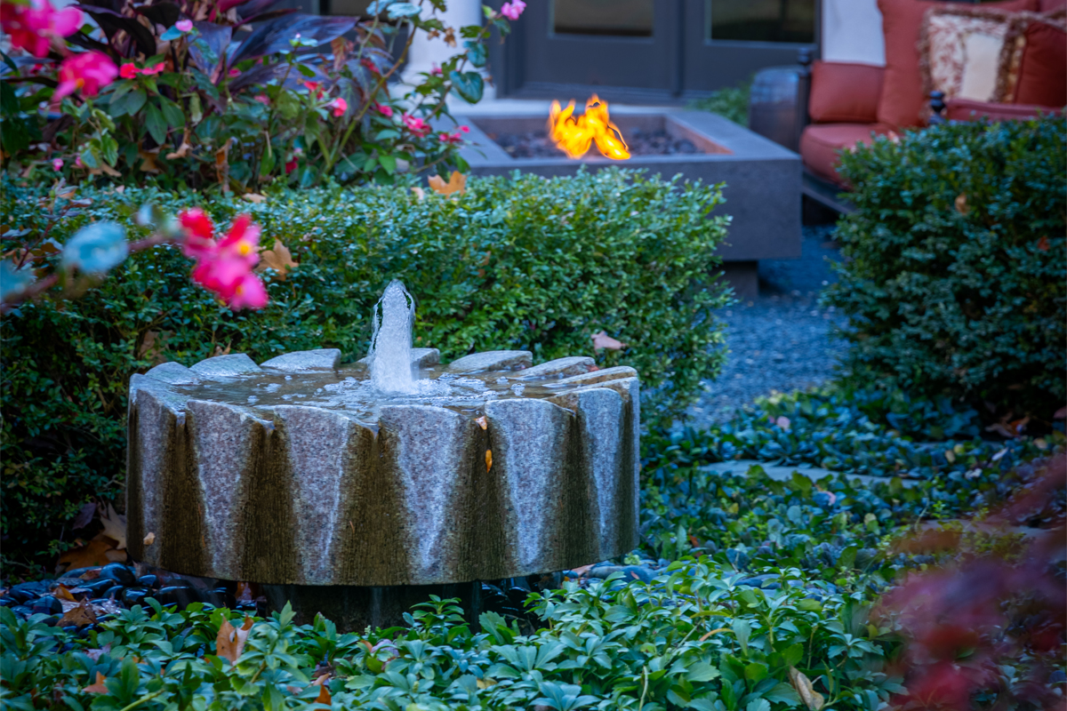 granite millstone fountain and fire pit